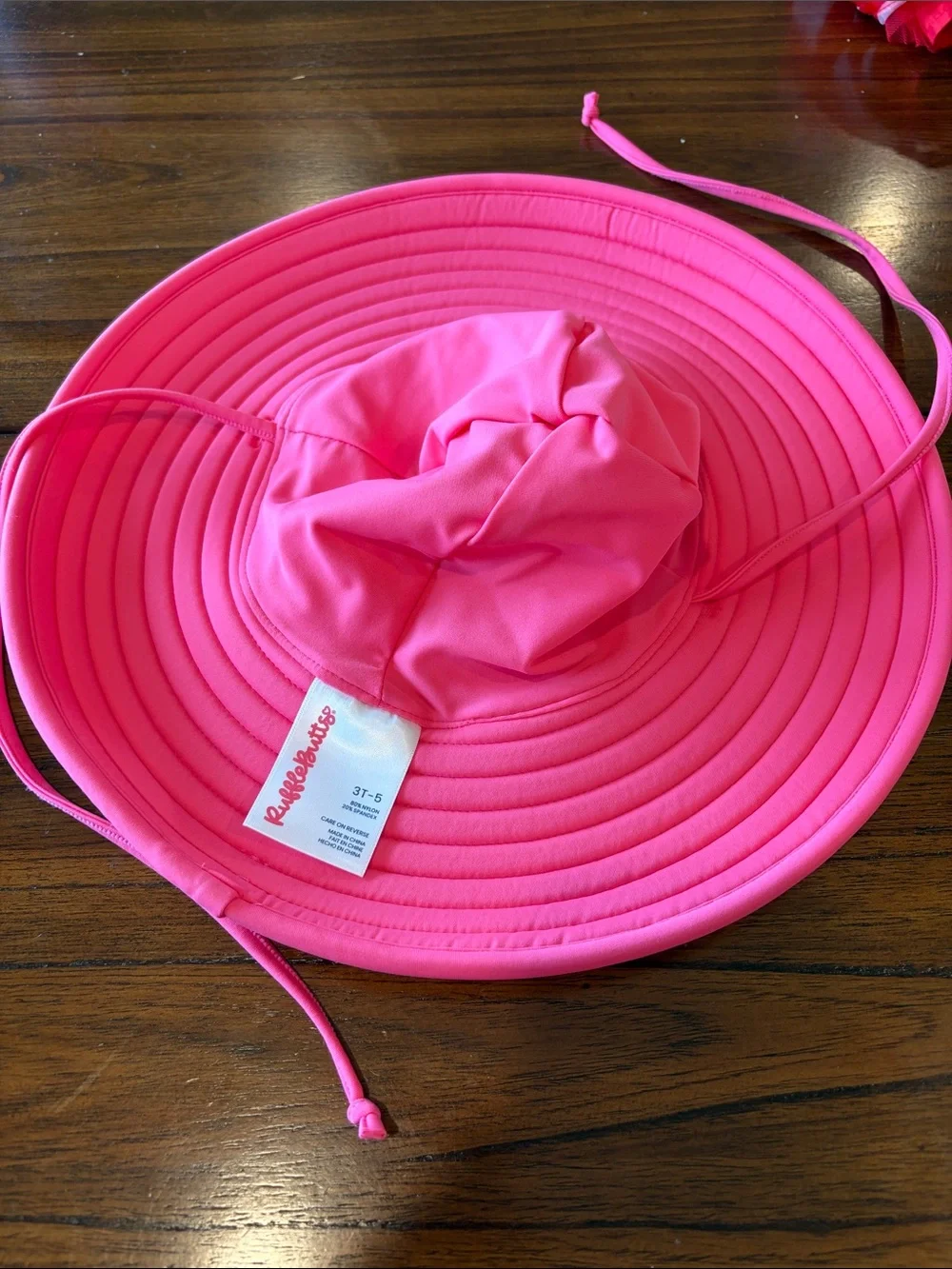 RuffleButts pink swim hat 3-5T